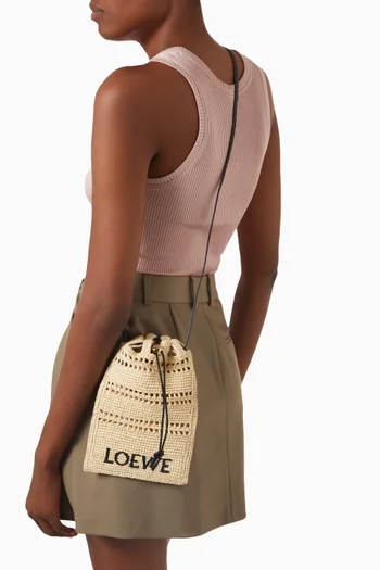 x Paula's Ibiza Drawstring Pocket Bag in Raffia