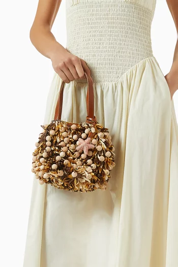 Mini Wood Pom Pom Shoulder Bag in Raffia