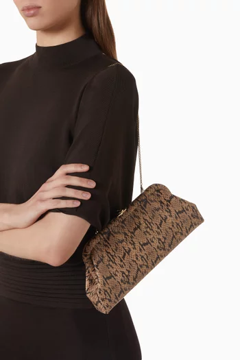 Skylar Clutch in Snake-embossed Leather