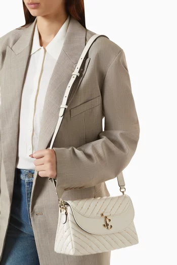 Curve Top Handle Bag in Quilted Nappa Leather