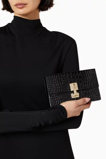 Glossed Clutch in Crocodile-embossed Leather