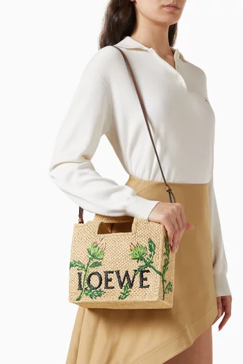 x Paula’s Ibiza Small Font Tote Bag in Raffia