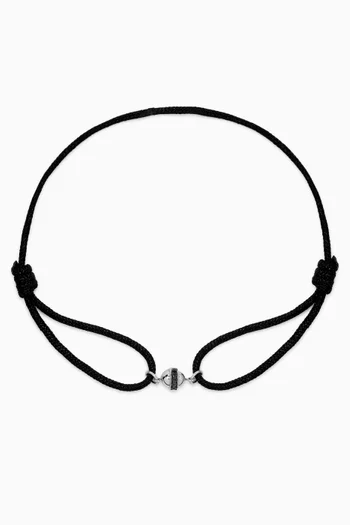 Single Atom Bracelet on a Rope