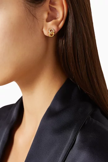 1980s Knot Swarovski Crystal Clip-on Earrings in Gold-plated Metal