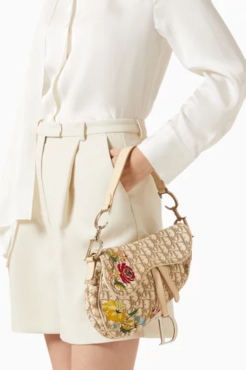 Floral Monogram Saddle Bag in Canvas & Leather