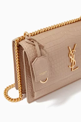 Buy SAINT LAURENT Neutral Medium Sunset Bag in Crocodile Embossed Shiny Leather For Women Online Ounass Oman