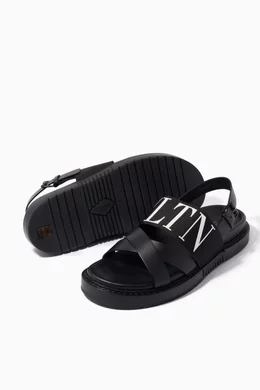 Buy Valentino Garavani Black Valentino Garavani VLTN Sandals in Leather For Men Online Ounass Oman