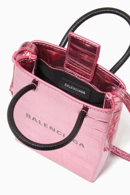 Buy Balenciaga Pink Shopping Phone Holder Bag in Metallic Croc embossed Calfskin For Women Online Ounass Oman