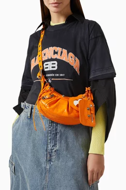 Buy Balenciaga Orange Le Cagole XS Shoulder Bag inCrocodile