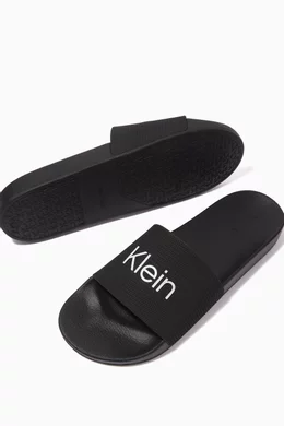 Buy Calvin Klein Black Logo Pool Slide Sandals in Recycled Rubber For Men Online Ounass Oman