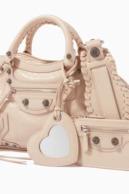 Buy Balenciaga Neutral Neo Cagole XS Handbag in Arena Lambskin For