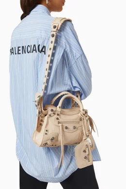 Buy Balenciaga Neutral Neo Cagole XS Handbag in Arena Lambskin For