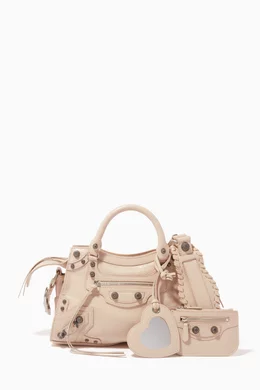 Buy Balenciaga Neutral Neo Cagole XS Handbag in Arena Lambskin For