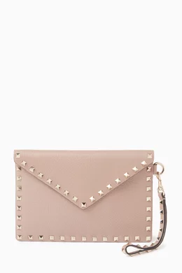 Buy Valentino Garavani Neutral Valentino Garavani Large Rockstud Envelope Pouch in Leather For Women Online Ounass Oman