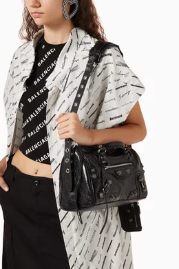Buy Balenciaga Black Medium Le Cagole Duffle Bag in Arena Lambskin 