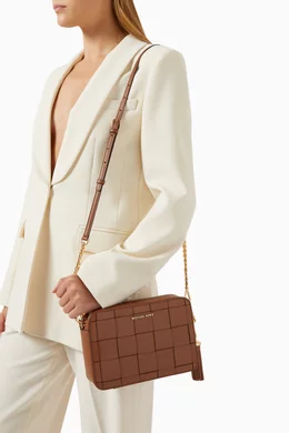 Buy Michael Kors Brown Medium Ginny Crossbody Bag in Woven Leather Online for Women Ounass Oman