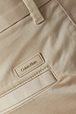 Buy Calvin Klein Color Slim Fit Chinos in Stretch Satin For Men Online Ounass Oman