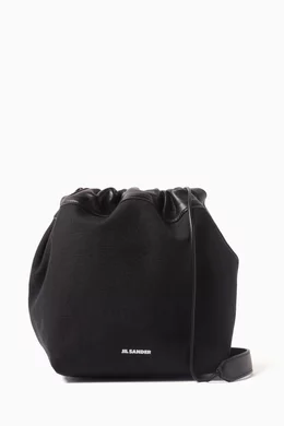 Buy Jil Sander Black Dumpling Drawstring Crossbody in Cotton-linen