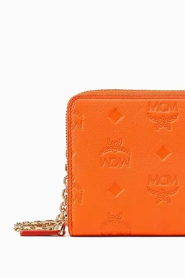 Buy MCM Orange Large Aren Chain Zip Around Wallet in Embossed Monogram For Women Online Ounass Oman