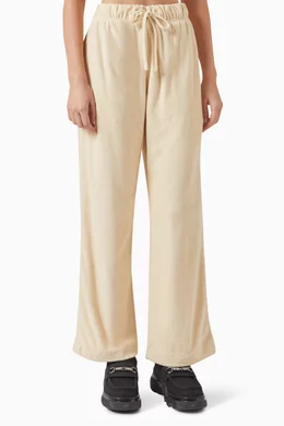Buy Burberry Neutral Equestrian Knight Print Pants in Cotton Towelling Online for Women Ounass Oman
