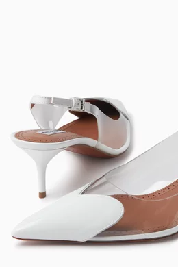 Buy Alaïa White Heart 55 Slingback Mules in Patent Leather For