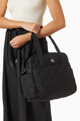 Buy Calvin Klein Black Puffer Diaper Bag in Quilted Nylon For Kids Online Ounass Oman