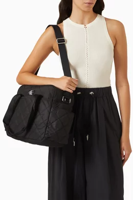 Buy Calvin Klein Black Puffer Diaper Bag in Quilted Nylon For Kids Online Ounass Oman