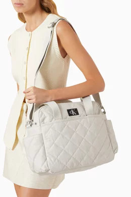 Buy Calvin Klein Grey Puffer Diaper Bag in Quilted Nylon For Baby Boys Online Ounass Oman