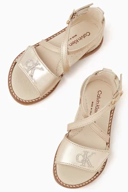 Buy Calvin Klein Gold Logo Sandals in Metallic leather For Girls Online Ounass Oman