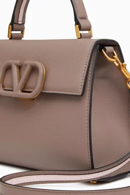 Buy Valentino Garavani Neutral Valentino Garavani Small VSLING Top handle Bag in Calfskin For Women Online Ounass Oman