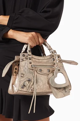 Buy Balenciaga Neutral Neo Cagole XS Handbag in Arena Lambskin For