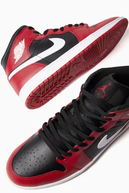 Buy Jordan Red Air Jordan 1 Mid Sneakers in Leather For Men Online Ounass Oman