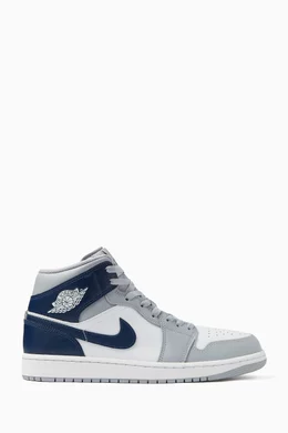 Buy Jordan Blue Air Jordan 1 Mid Sneakers in Leather For Men Online Ounass Oman