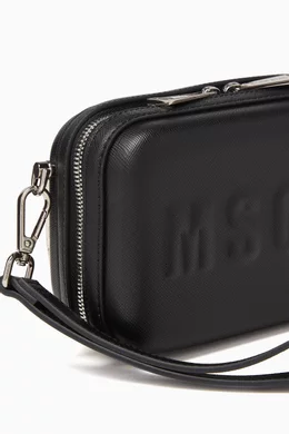 Buy MSGM Black Logo Embossed Pochette Crossbody Bag in Faux Leather For Girls Online Ounass Oman