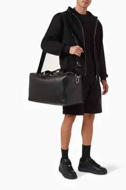 Buy Burberry Black Embossed Check Duffle Bag in Calf Leather For