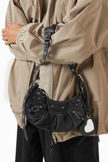 hover state of Le Cagole XS Shoulder Bag in Dirty-effect Arena Lambskin