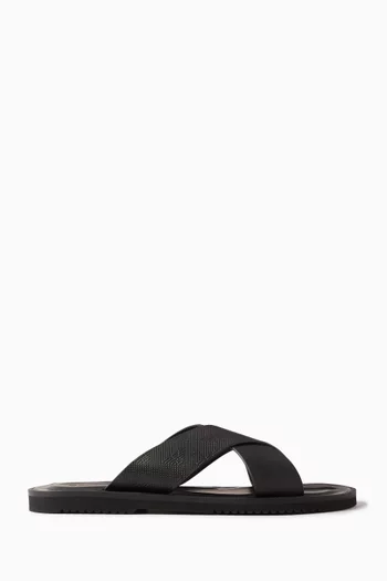 حذاء مفتوح بسيور متقاطعة وشعار النسر جلد