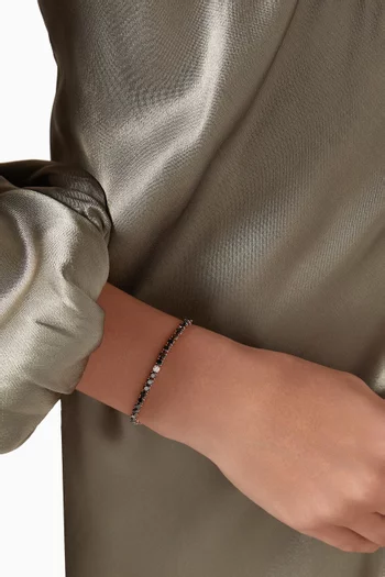 سوار تنس مرصع بماس أسود ذهب وردي عيار 18