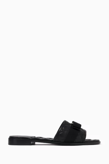 Vara Bow Slides in Quilted Nappa Leather