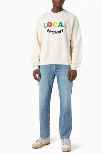 سويت شيرت بعبارة Local Optimist صوف