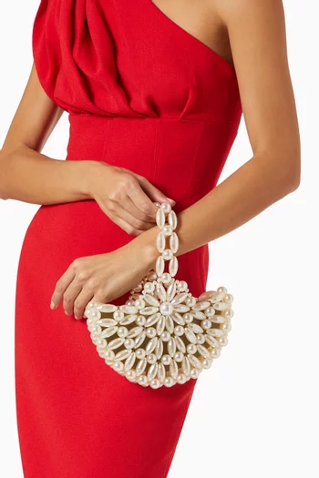 كلاتش سيلين بتصميم هلال خرز أكريليك وستان