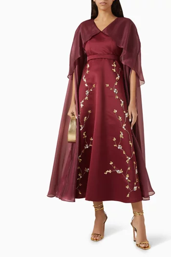 فستان متوسط الطول مزين بتطريزات زهور