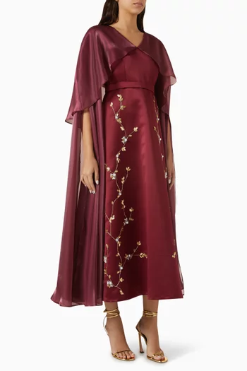 فستان متوسط الطول مزين بتطريزات زهور