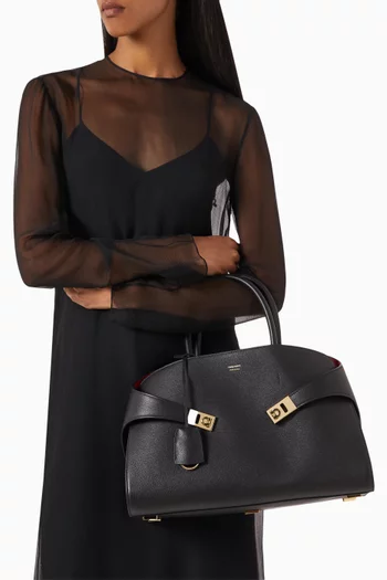 Medium Hug Top Handle Bag in leather
