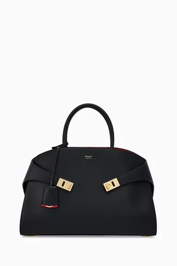 Medium Hug Top Handle Bag in leather