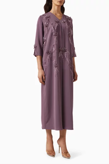 قفطان مزين بالريش وبالخرز