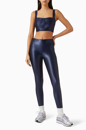 بلوزة بلا أكمام سيلين هيروين سبورت × منى قطان