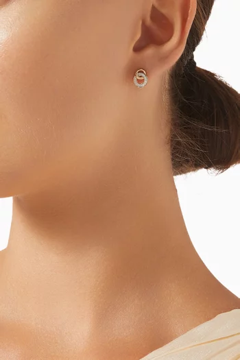 أقراط بتصميم حلقات متداخلة مرصعة بالماس ذهب أصفر عيار 18