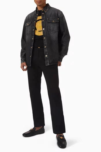 قميص دينم بلون باهت