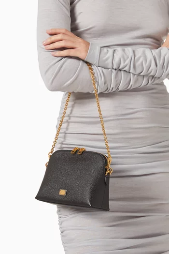 حقيبة ميني بحلية شعار الماركة جلد دوفين